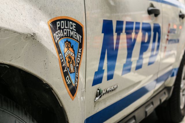 The NYPD logo on a car.